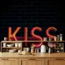 Vibrant Neon Kiss Lettering on Dark Brick Wall Mural 7
