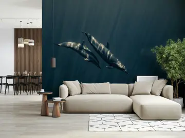 Sunlit Dolphins Underwater Journey Wall Mural