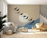 Graceful Flamingo Flight at Dusk Wall Mural