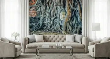 Serene Buddha Head in Ancient Roots Wall Mural